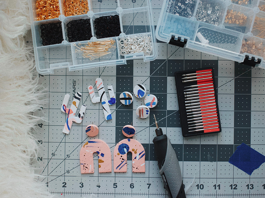 Work table with supplies and tools for making jewelry